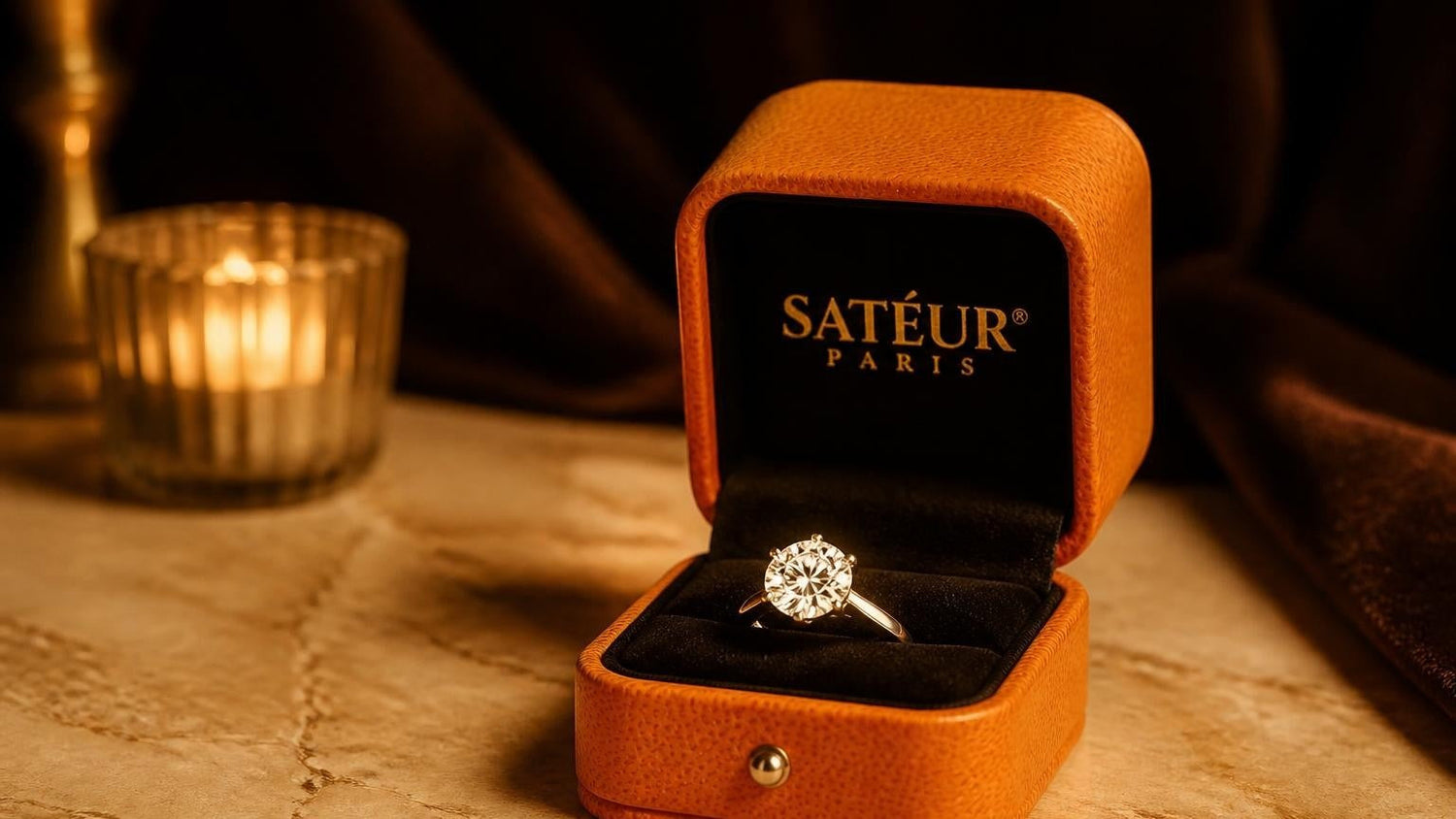 2 carat diamond ring in open orange Satéur box with black velvet interior