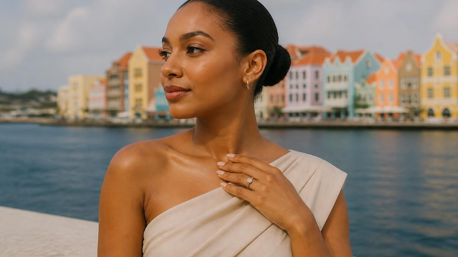 Engagement ring in Curaçao — elegant woman with solitaire ring, Willemstad Handelskade waterfront