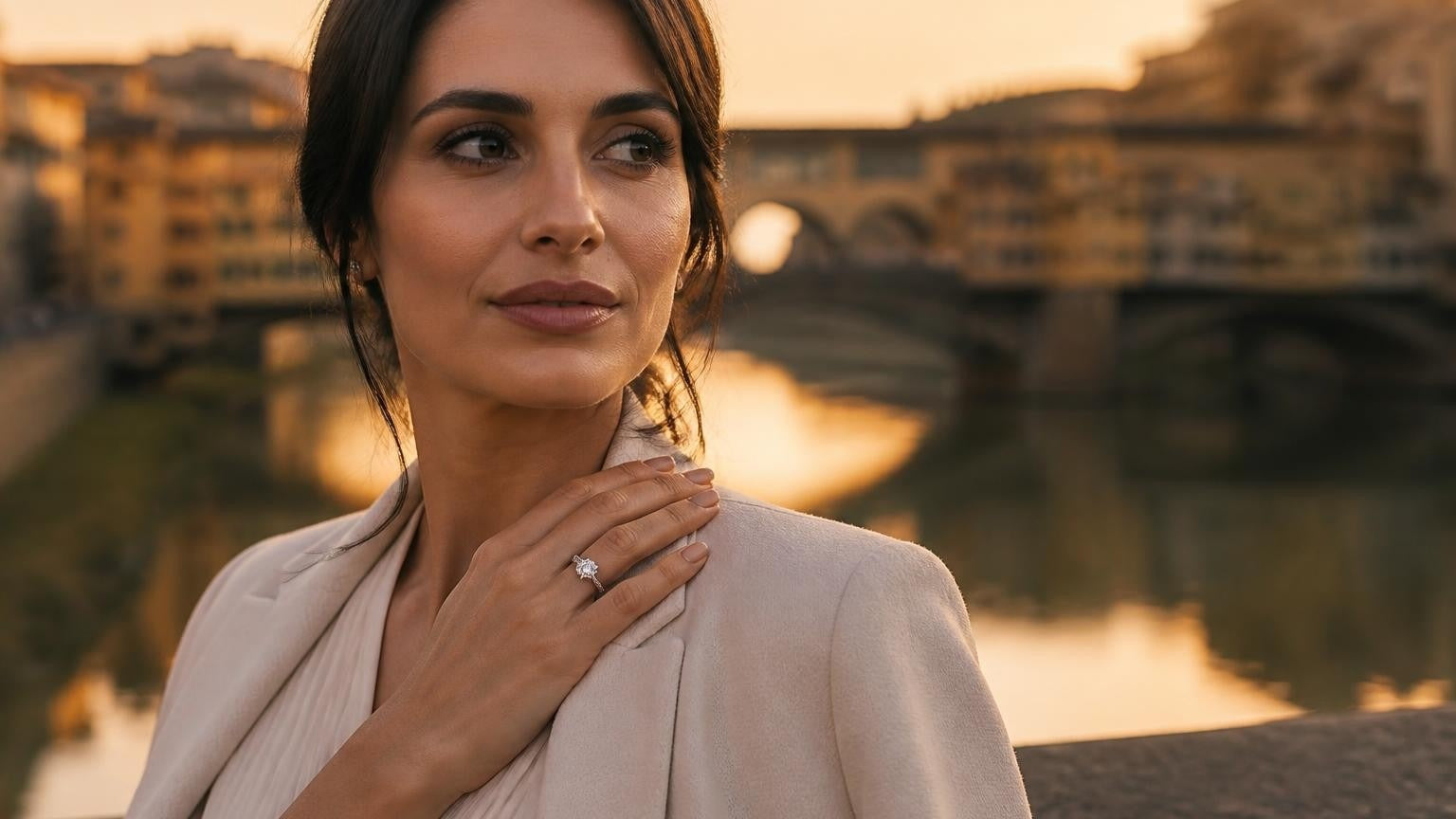 Best engagement rings in Florence — Satéur Destinée Ring with Ponte Vecchio at golden hour
