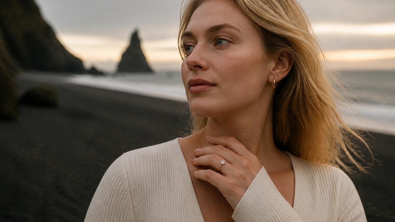Best engagement rings in Iceland — Satéur Destinée Ring on Icelandic woman at Reynisfjara black-sand beach