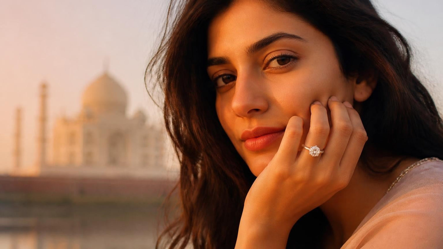 Elegant Indian woman with Satéur Destinée Ring™ and Taj Mahal at sunrise — best engagement rings in India