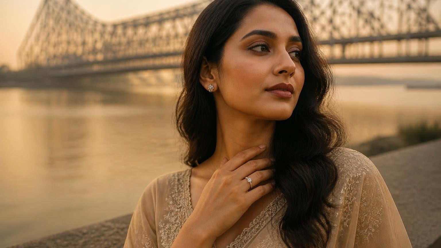 Best engagement rings in Kolkata — Satéur Destinée Ring with Howrah Bridge at golden hour