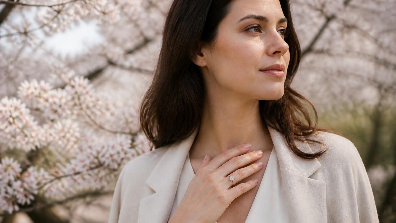 Best engagement rings in Newark NJ — woman at Branch Brook Park cherry blossoms wearing Satéur Destinée Ring