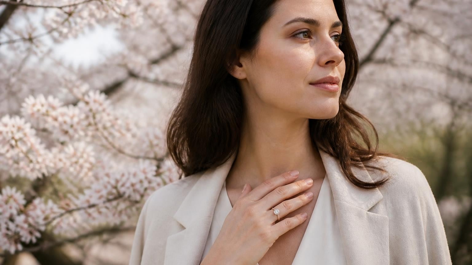 Best engagement rings in Newark NJ — woman at Branch Brook Park cherry blossoms wearing Satéur Destinée Ring