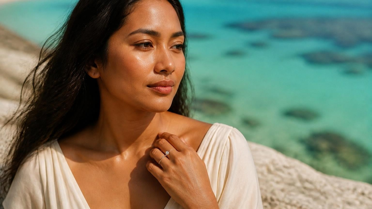 Best engagement rings in Northern Mariana Islands — Chamorro woman with Satéur Destinée ring by the Managaha Island turquoise lagoon