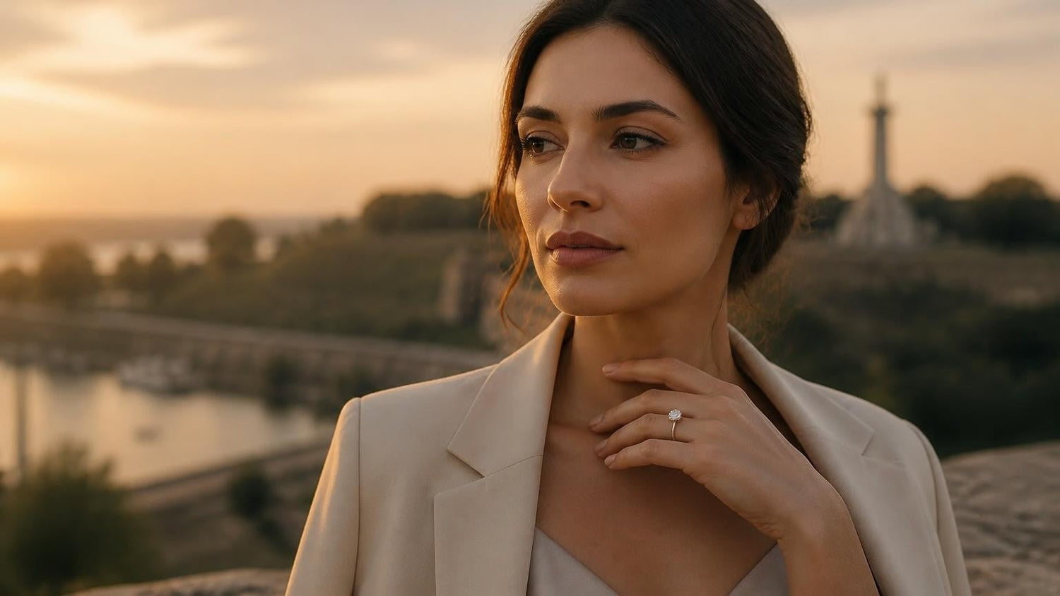Best engagement rings in Serbia — elegant Serbian woman with solitaire ring, Kalemegdan Fortress at sunset