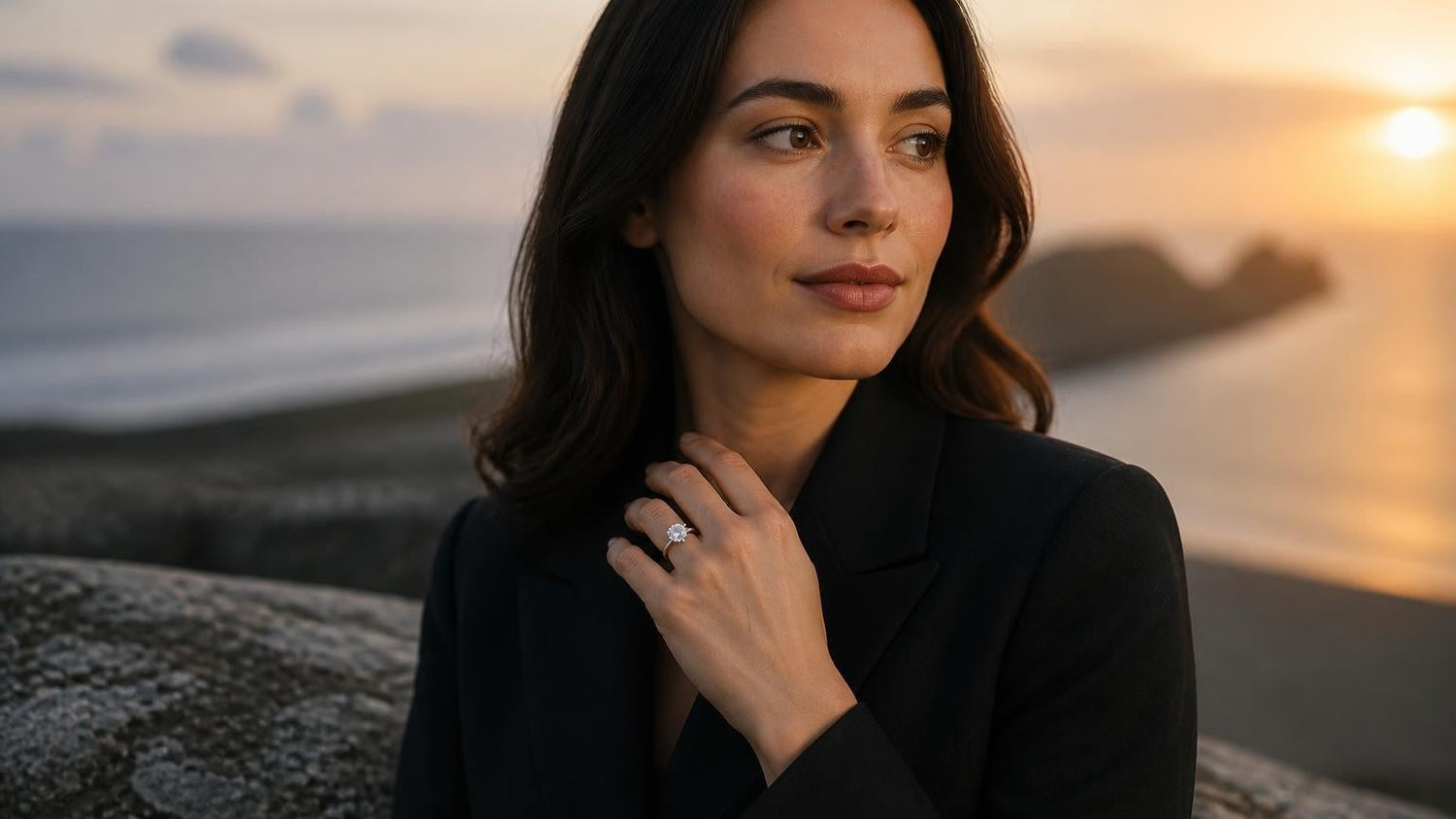 Best engagement rings in Swansea — elegant Welsh woman with Satéur Destinée Ring™ at Rhossili Bay sunset