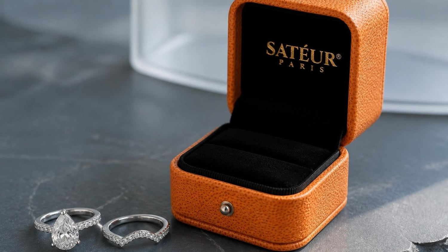 best wedding band for pear shaped engagement ring with open Satéur box
