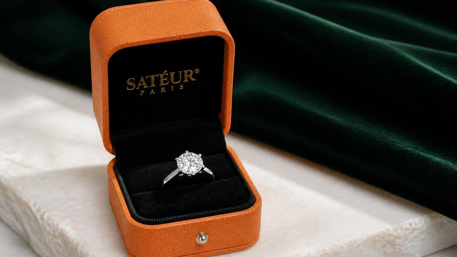 Open Satéur ring box with diamond simulant engagement ring — diamond alternatives overview