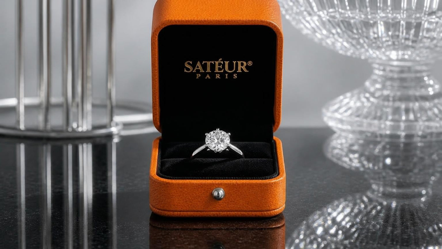Most expensive engagement rings: open Satéur box with diamond simulant ring on black velvet