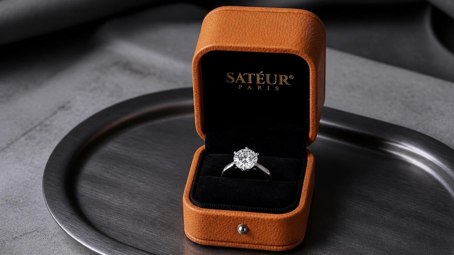 Non tarnish engagement ring in open Satéur box with black velvet interior