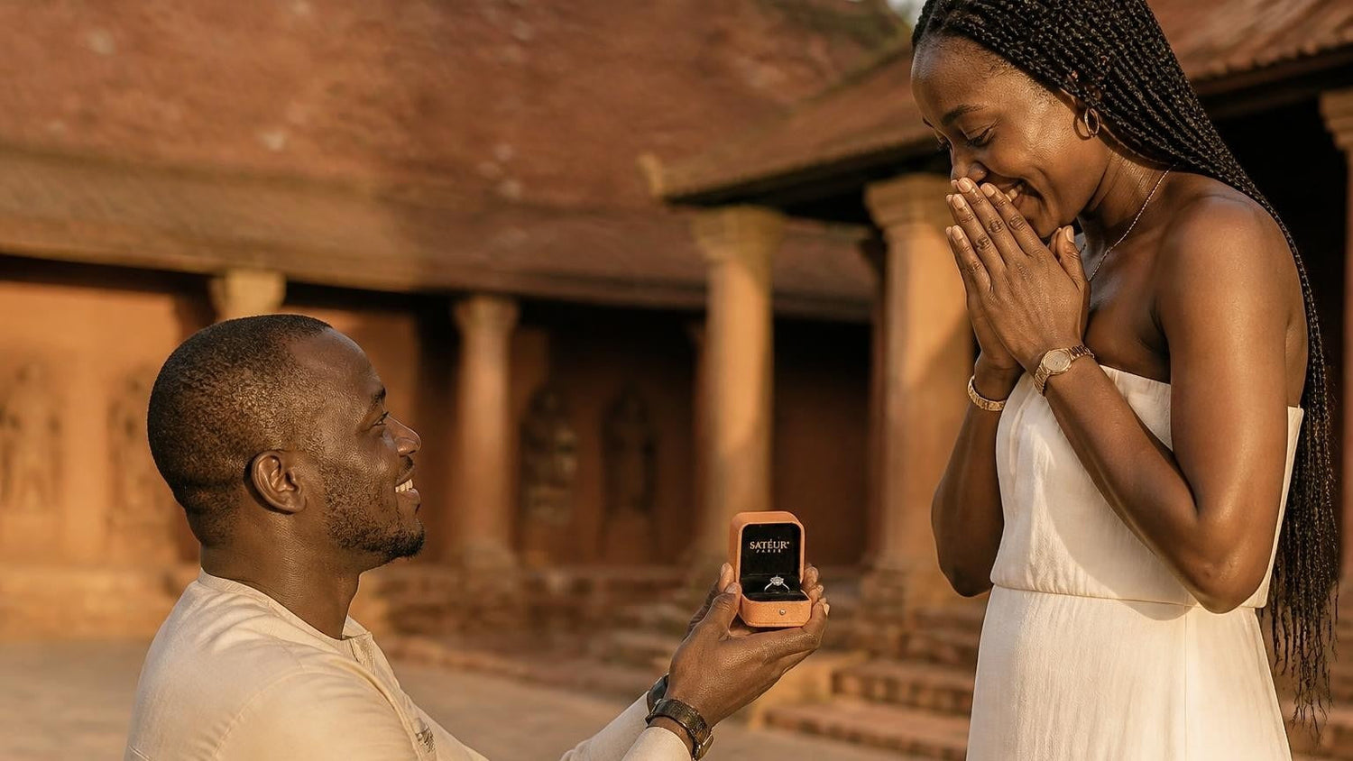 Marriage proposal in Benin with the Satéur Destinée Ring — couple at the Royal Palaces of Abomey