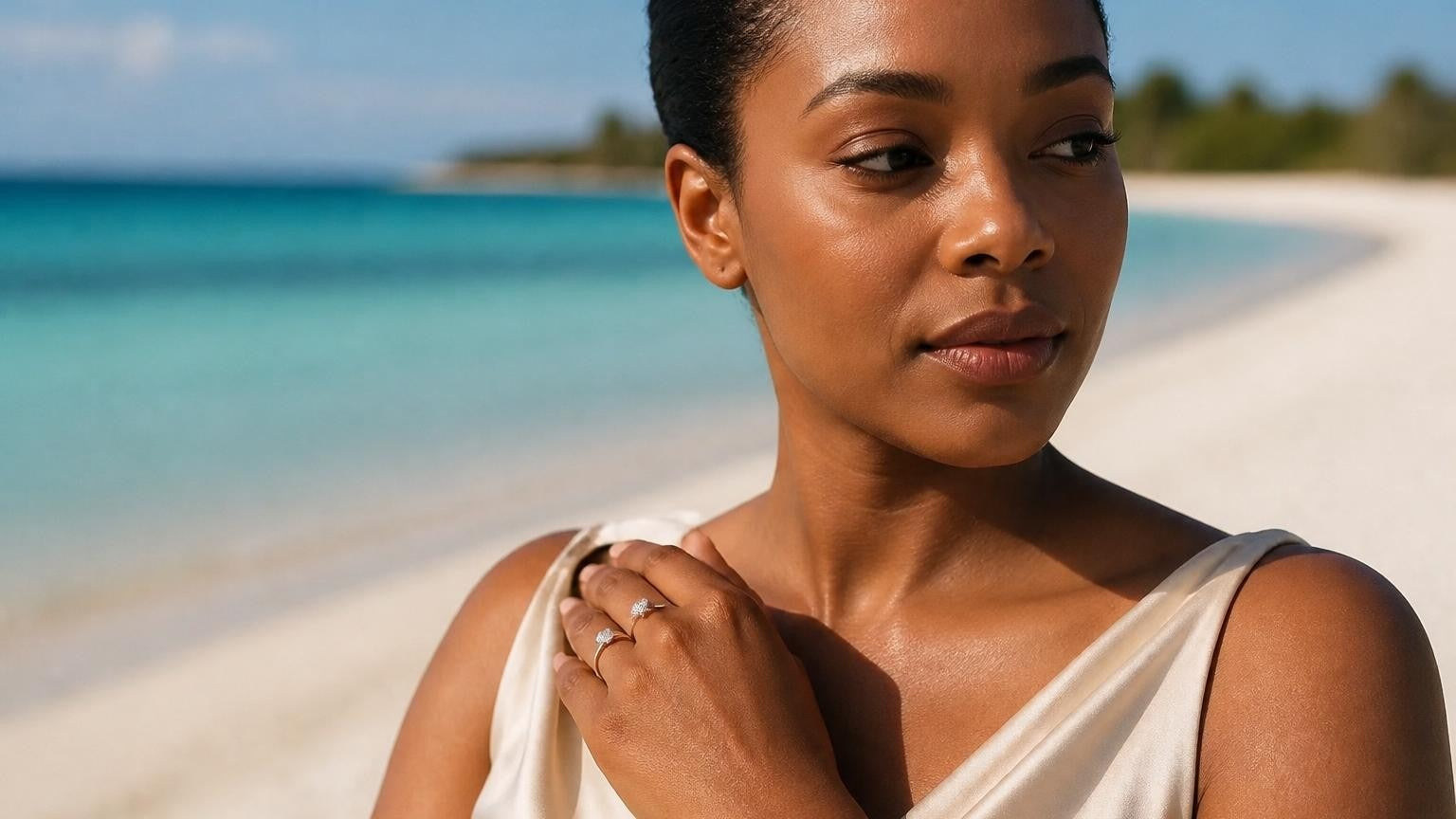Best engagement rings in Anguilla — Anguillian woman wearing the Satéur Destinée Ring™ at Shoal Bay East