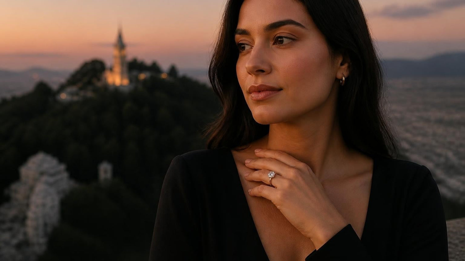 Best engagement rings in Bogotá — elegant Colombian woman with Satéur Destinée Ring, Monserrate chapel at dusk