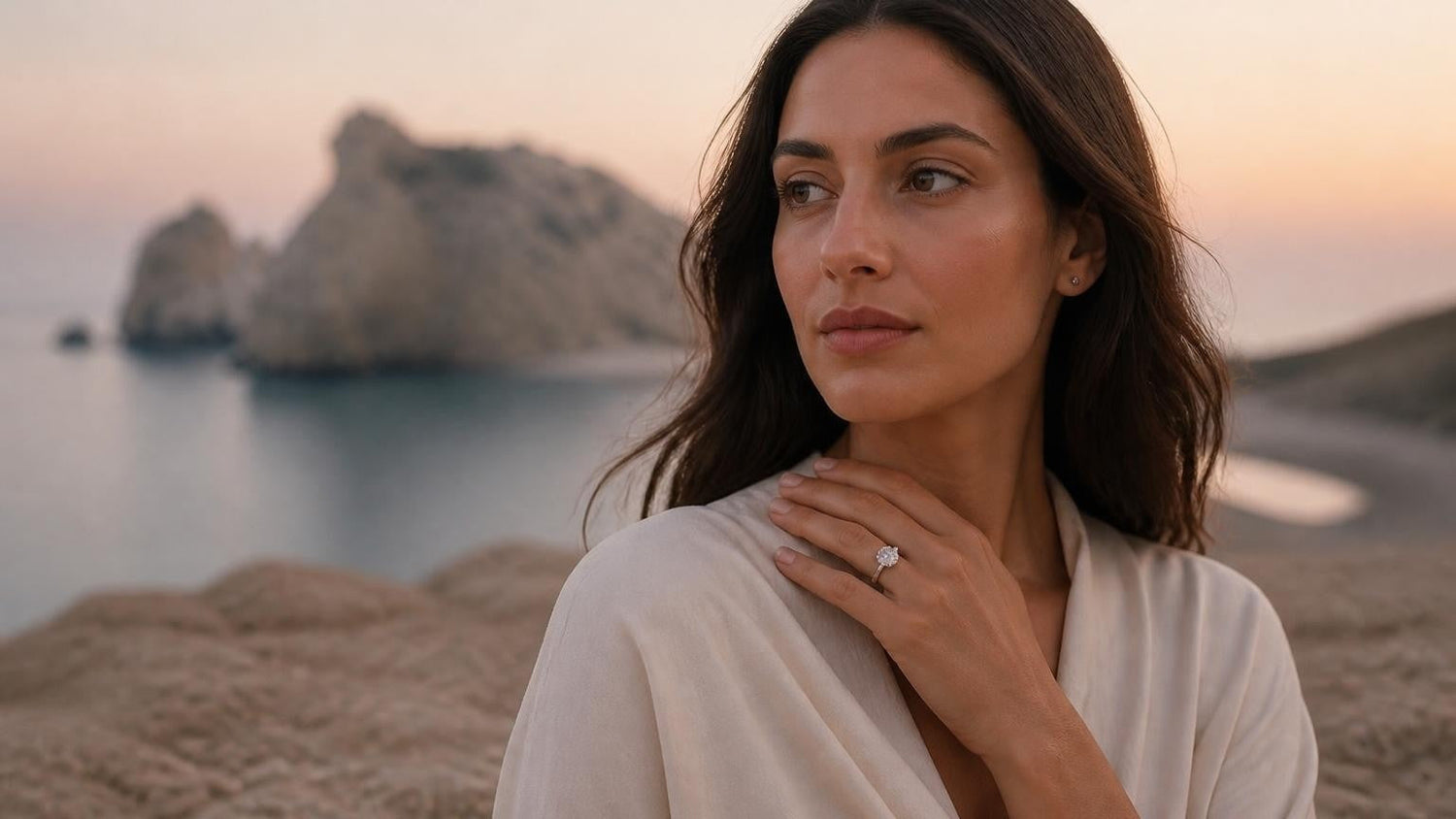 Best engagement rings in Cyprus — Cypriot woman with solitaire ring at Petra tou Romiou (Aphrodite's Rock)