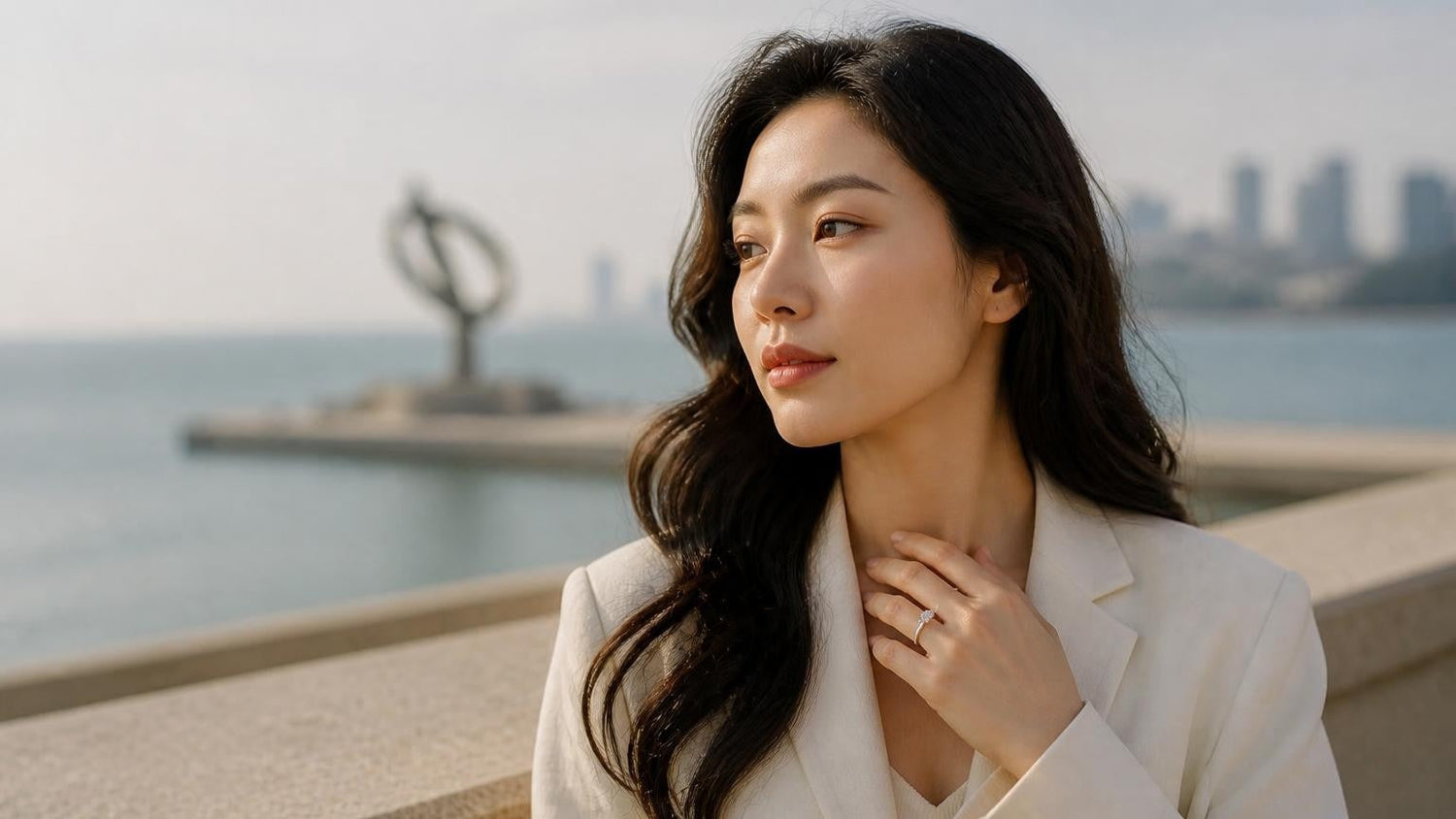 Best engagement rings in Dalian — Satéur Destinée Ring™ with Xinghai Square sundial sculpture behind