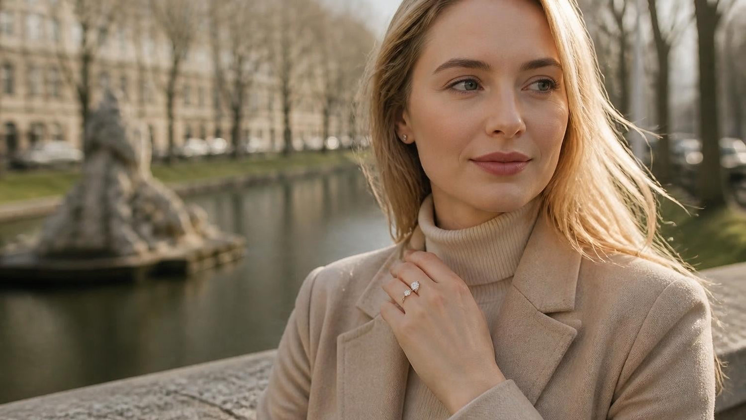 Best engagement rings in Düsseldorf — elegant bride on the Königsallee canal with ring