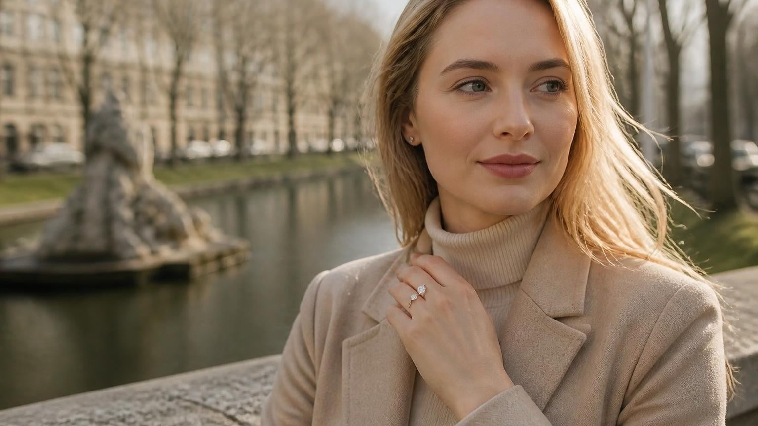 Best engagement rings in Düsseldorf — elegant bride on the Königsallee canal with ring