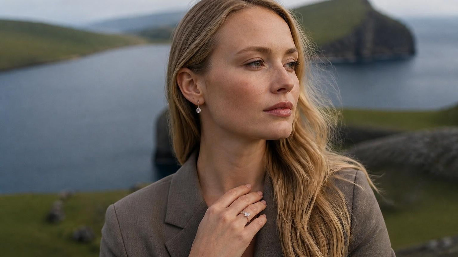 Best engagement rings in the Faroe Islands — elegant Faroese woman with Sørvágsvatn lake and sea stacks