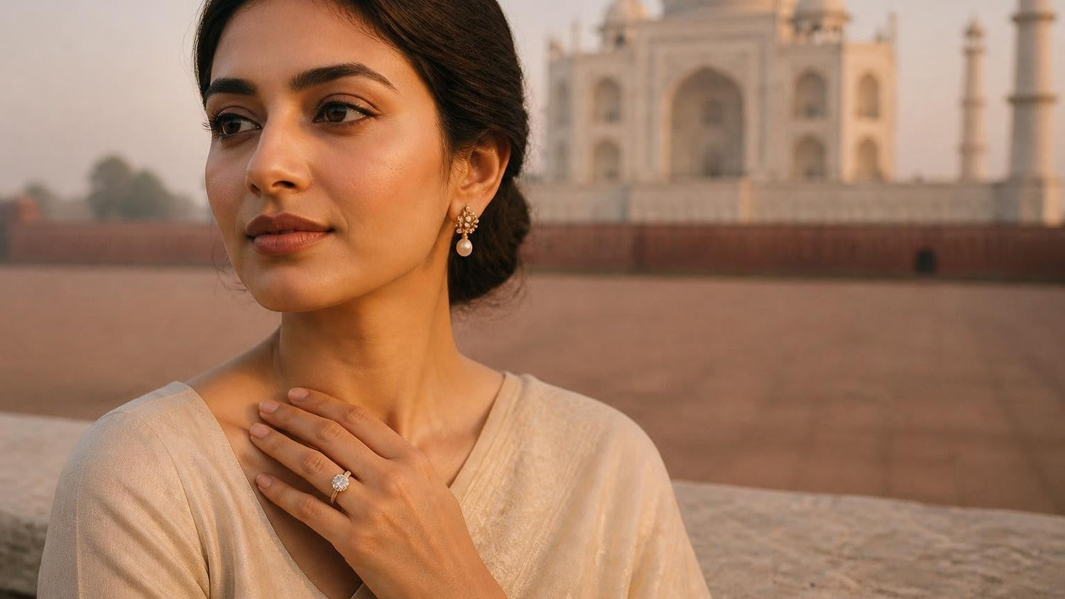 Elegant Indian woman with Satéur Destinée Ring™ and Taj Mahal at sunrise — best engagement rings in India