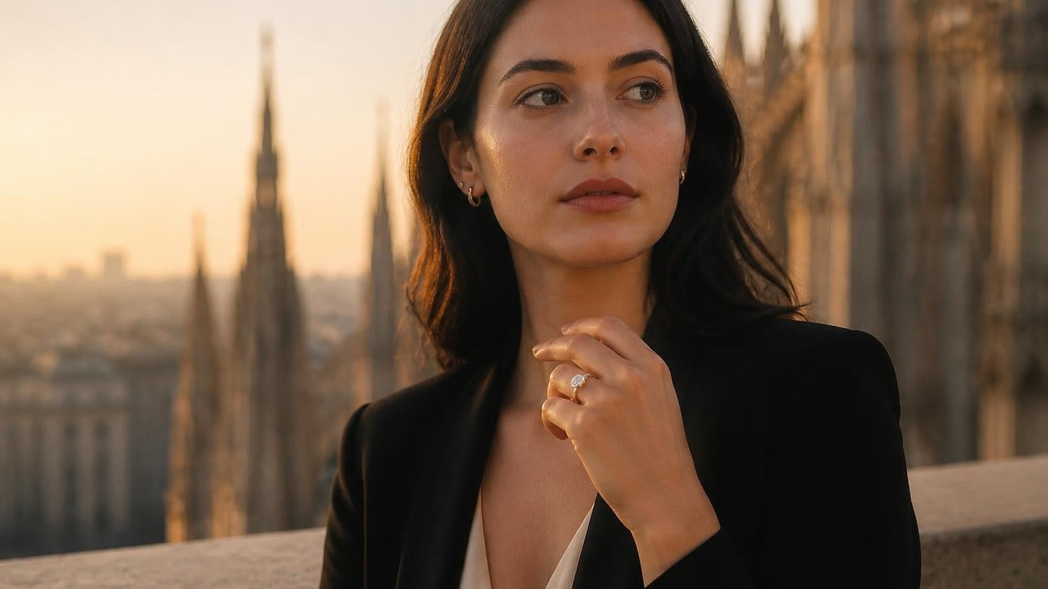 Best engagement rings in Milan — elegant Milanese woman with Satéur Destinée Ring, Duomo di Milano at golden hour