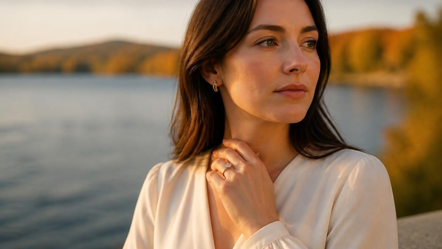 Best engagement rings in Sherbrooke — Québécoise woman by Lac des Nations wearing a Satéur Destinée ring in autumn light