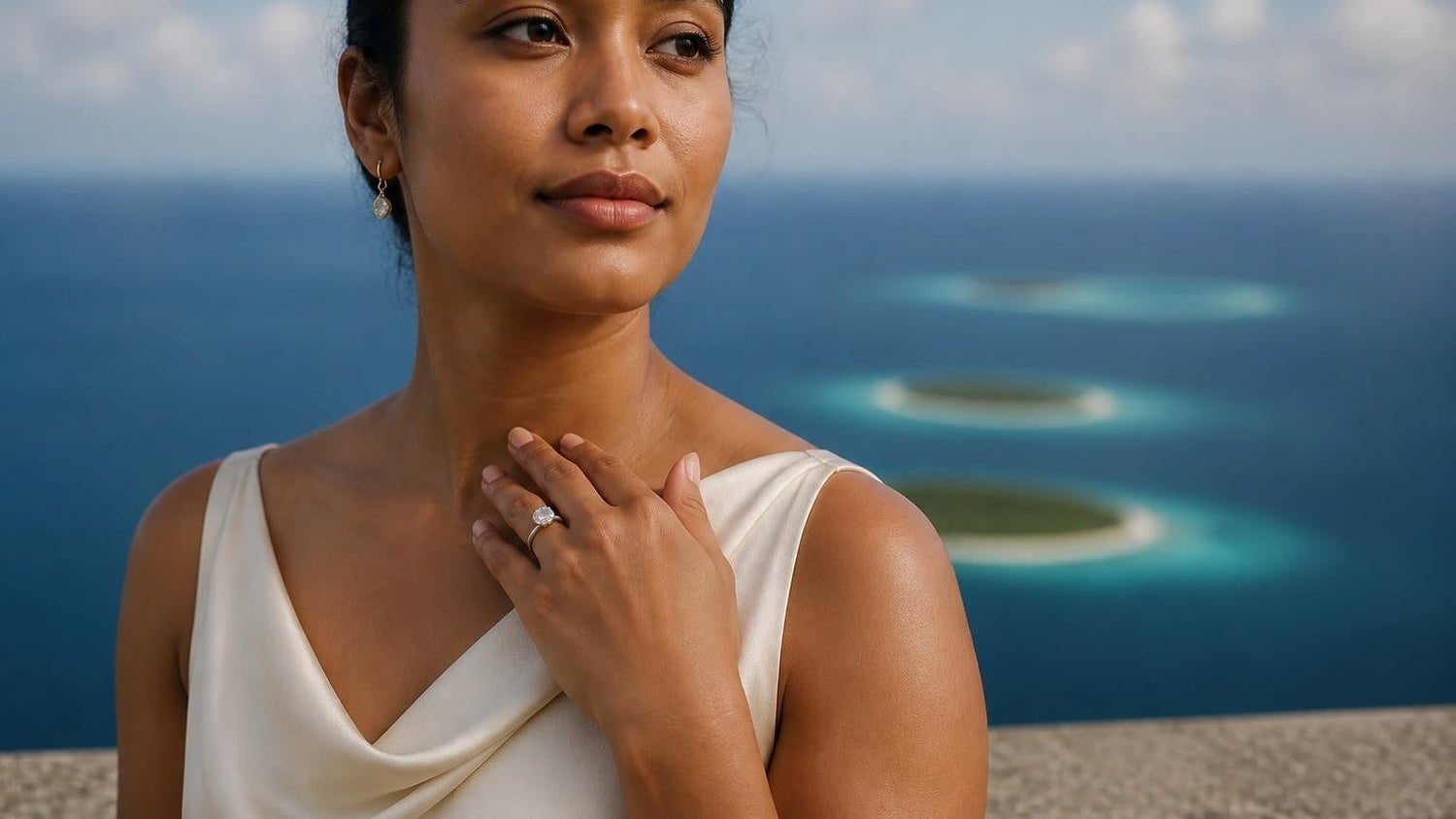Best engagement rings in Tokelau — Satéur Destinée Ring on hand, coral atoll backdrop
