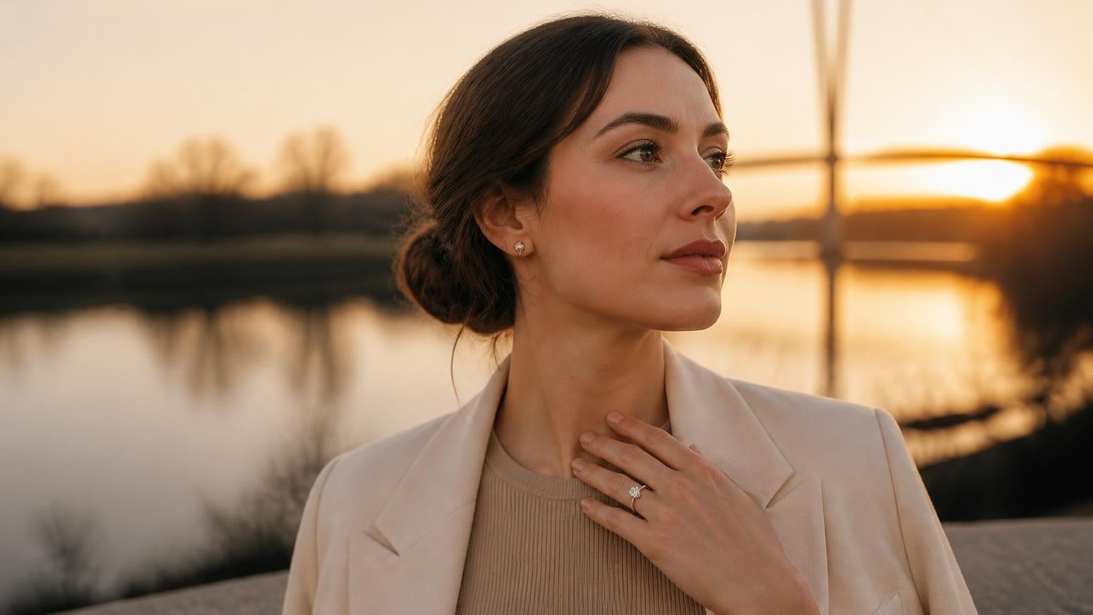 Best engagement rings in Tulsa — Satéur Destinée Ring at sunset over the Arkansas River, Gathering Place