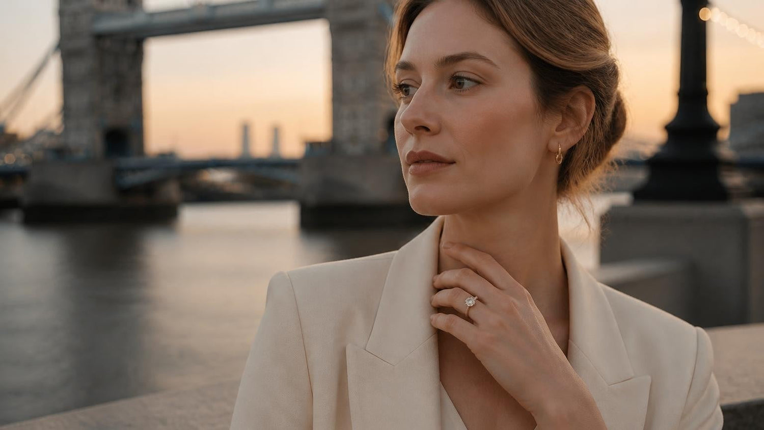Best engagement rings in the United Kingdom — Satéur Destinée Ring with Tower Bridge at golden-hour dusk, London