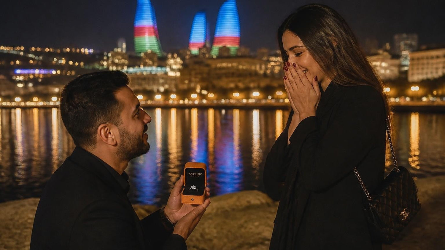 Marriage proposal in Azerbaijan with the Satéur Destinée Ring — Flame Towers glowing over the Caspian at dusk