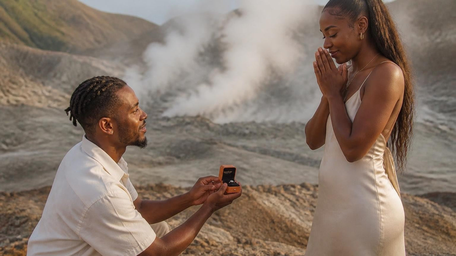 Marriage proposal in Dominica with the Satéur Destinée Ring — couple at Trafalgar Falls in the rainforest