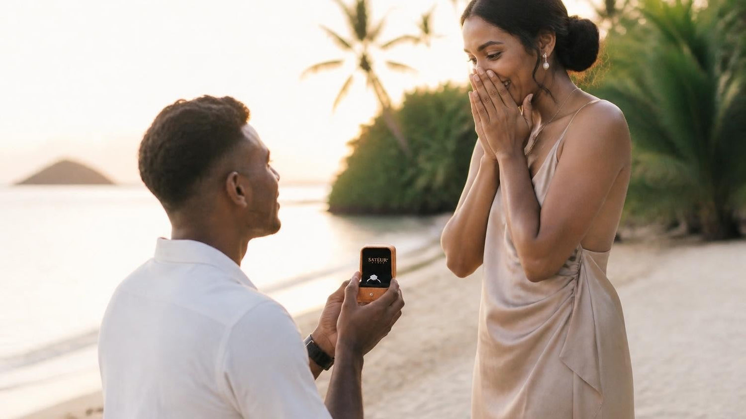 Marriage proposal in Fiji with the Satéur Destinée Ring — a couple on a Mamanuca Islands beach at sunrise