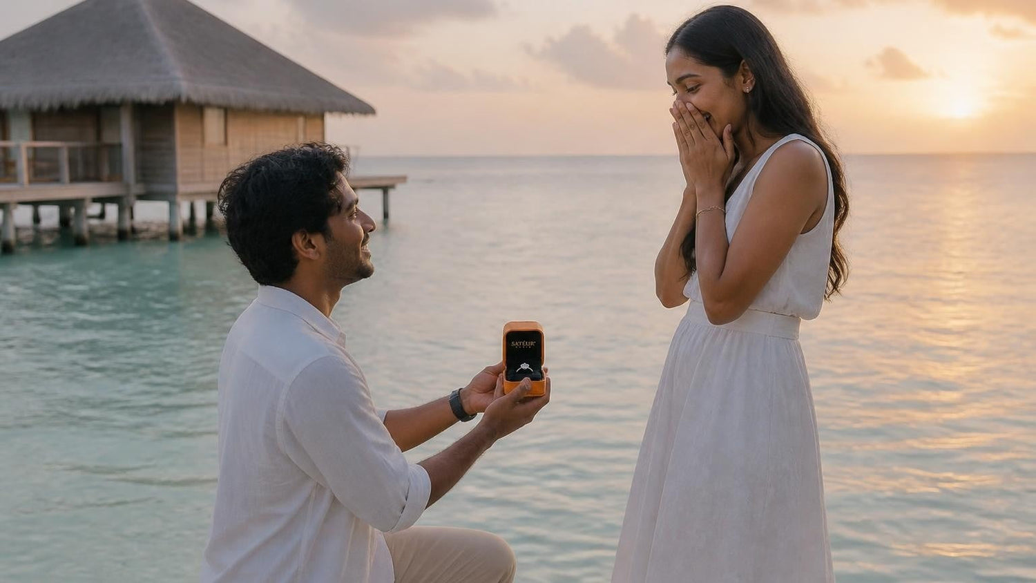 Marriage proposal in the Maldives with the Satéur Destinée Ring at an overwater bungalow at sunrise