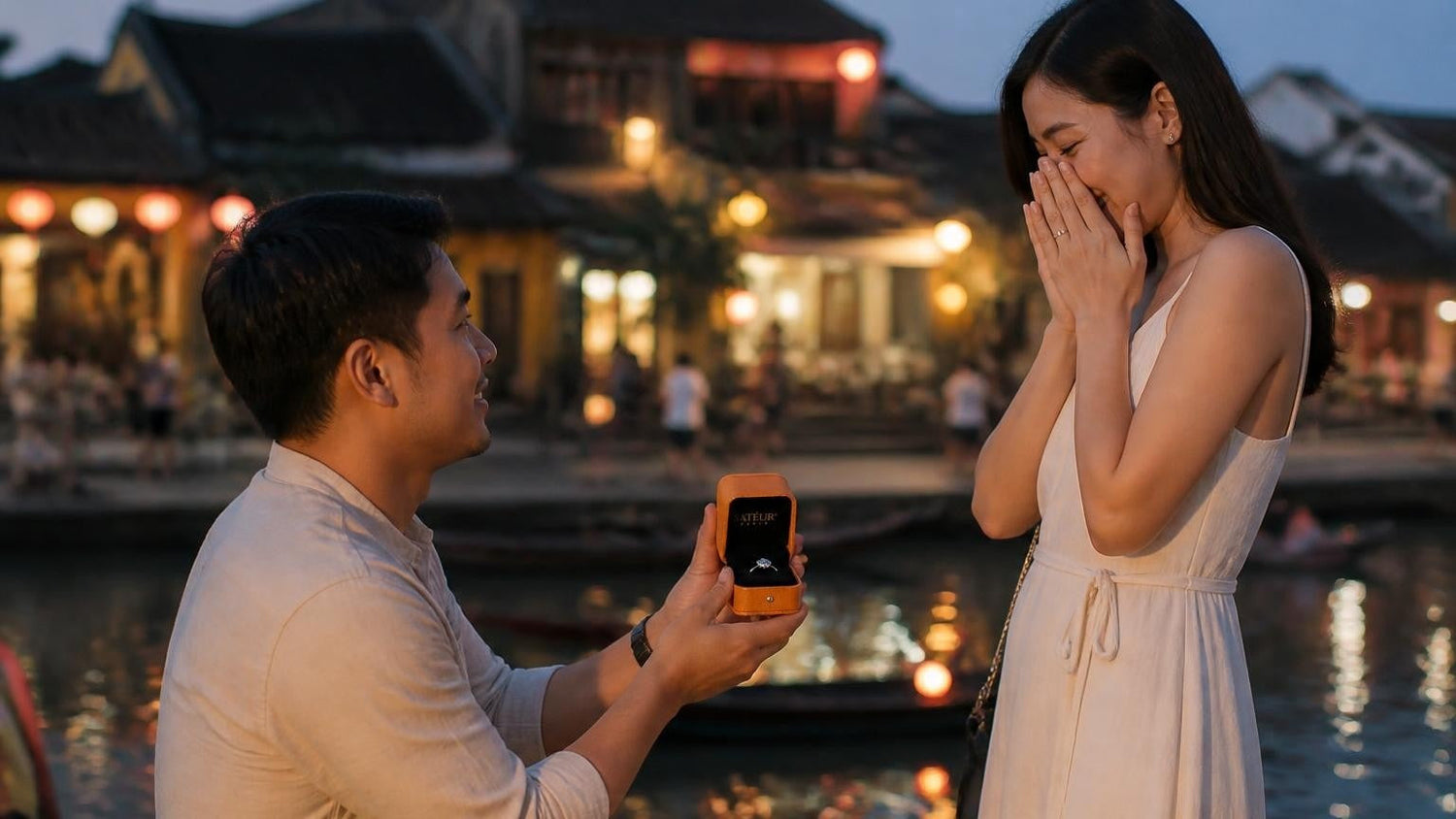 Marriage proposal in Vietnam with the Satéur Destinée Ring — couple on a lantern-lit Hoi An Ancient Town street at dusk